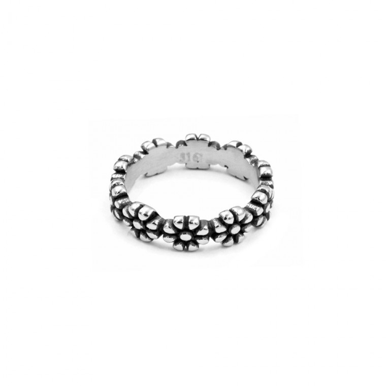 Solid ring with intertwined flowers